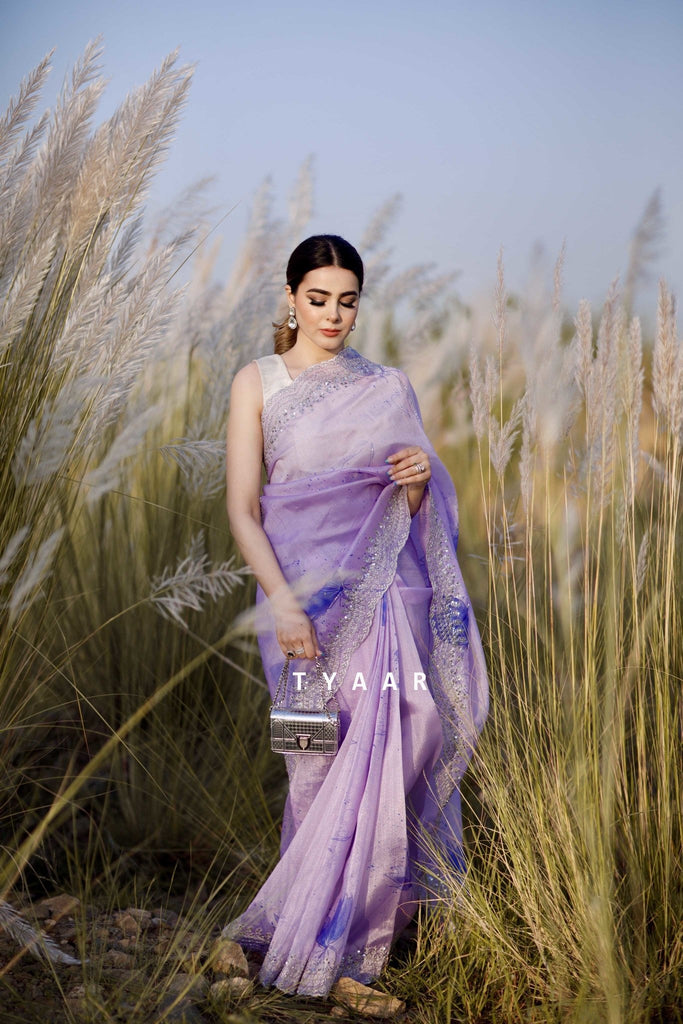 Plain organza sarees with embroidered threadwork and mirror work flowers  along the borders, charm and… | Plain organza sarees, Organza sarees,  Indian outfits modern